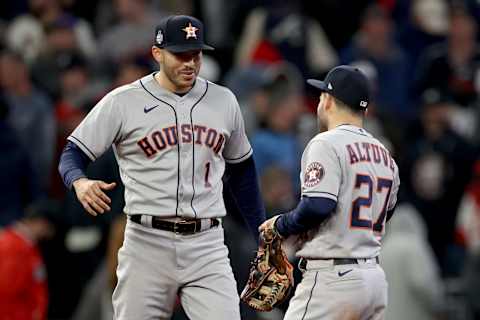 Carlos Correa #1 and Jose Altuve #27 of the Houston Astros (Photo by Elsa/Getty Images)