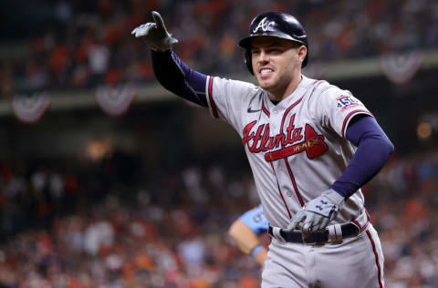 HOUSTON, TEXAS - NOVEMBER 02: Freddie Freeman #5 of the Atlanta Braves celebrates after hitting a solo home run against the Houston Astros during the seventh inning in Game Six of the World Series at Minute Maid Park on November 02, 2021 in Houston, Texas. (Photo by Carmen Mandato/Getty Images)