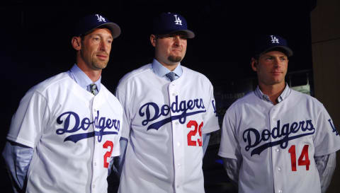 Luis Gonzalez, Jason Schmidt and Mike Lieberthal (Photo by Kirby Lee/Getty Images)