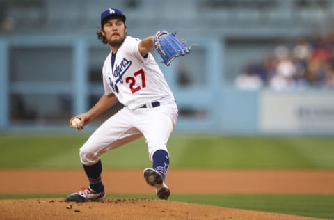 LOS ANGELES, CALIFORNIA - JUNE 28: Trevor Bauer #27 of the Los Angeles Dodgers throws the first pitch of the game against the San Francisco Giants. (Photo by Meg Oliphant/Getty Images)