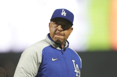 SAN FRANCISCO, CALIFORNIA - SEPTEMBER 04: Manager Dave Roberts #30 of the Los Angeles Dodgers walks back to the dugout after making a pitching change against the San Francisco Giants in the bottom of the seventh inning at Oracle Park on September 04, 2021 in San Francisco, California. The Dodger won the game 6-1. (Photo by Thearon W. Henderson/Getty Images)