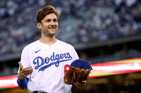 LOS ANGELES, CALIFORNIA - OCTOBER 21: Trea Turner #6 of the Los Angeles Dodgers smiles as he returns to the dugout during game five of the National League Championship Series at Dodger Stadium on October 21, 2021 in Los Angeles, California. (Photo by Harry How/Getty Images)