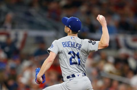 ATLANTA, GEORGIA - OCTOBER 23: Walker Buehler #21 of the Los Angeles Dodgers throws a pitch during the second inning of Game Six of the National League Championship Series against the Atlanta Braves at Truist Park on October 23, 2021 in Atlanta, Georgia. (Photo by Michael Zarrilli/Getty Images)