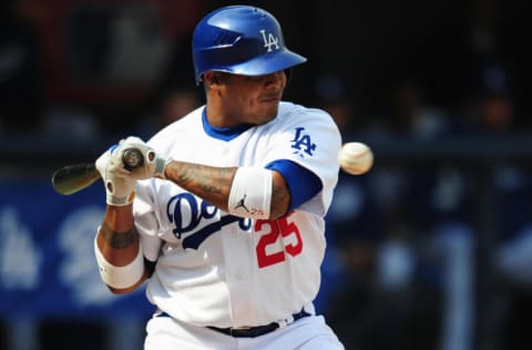 Andruw Jones of the Los Angeles Dodgers avoids a pitch during action against the San Diego Padres in the second Major League Baseball game in China on March 16, 2008 at the Wukesong Baseball Stadium in Beijing, venue for the 2008 Olympics baseball event. Some 11,890 fans saw the second game of a two-game series between the California rivals, with the Padres defeating the Dodgers 6-3. Both teams are using only a half dozen players who will be on the opening day 25-man roster. AFP PHOTO/Frederic J. BROWN (Photo credit should read FREDERIC J. BROWN/AFP via Getty Images)