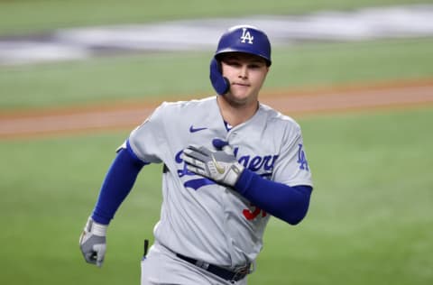 ARLINGTON, TEXAS - OCTOBER 25: Joc Pederson #31 of the Los Angeles Dodgers celebrates after hitting a solo home run against the Tampa Bay Rays during the second inning in Game Five of the 2020 MLB World Series at Globe Life Field on October 25, 2020 in Arlington, Texas. (Photo by Tom Pennington/Getty Images)