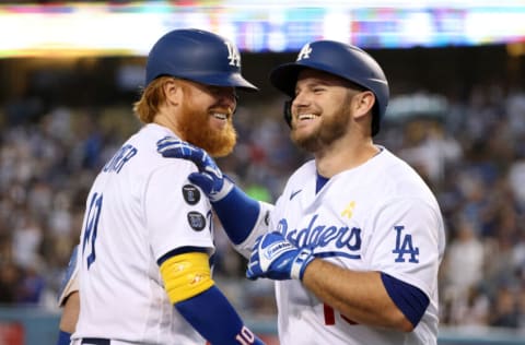 LOS ANGELES, CALIFORNIA - SEPTEMBER 01: Max Muncy #13 of the Los Angeles Dodgers celebrates his solo homerun with Justin Turner #10, to take a 1-0 lead over the Atlanta Braves, during the first inning at Dodger Stadium on September 01, 2021 in Los Angeles, California. (Photo by Harry How/Getty Images)