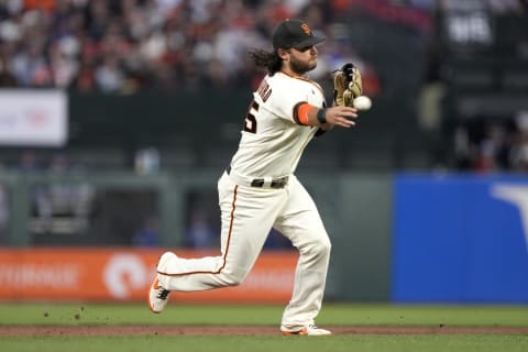 SAN FRANCISCO, CALIFORNIA – OCTOBER 14: Brandon Crawford #35 of the San Francisco Giants makes a play against the Los Angeles Dodgers during the second inning in game 5 of the National League Division Series at Oracle Park on October 14, 2021 in San Francisco, California. (Photo by Thearon W. Henderson/Getty Images)