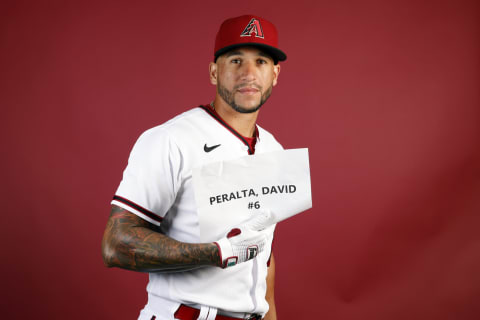 SCOTTSDALE, ARIZONA – MARCH 21: David Peralta #6 of the Arizona Diamondbacks poses during Photo Day at Salt River Fields at Talking Stick on March 21, 2022 in Scottsdale, Arizona. (Photo by Chris Coduto/Getty Images)