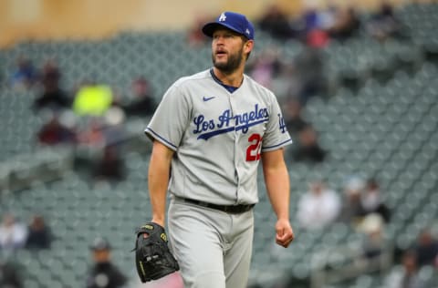 MINNEAPOLIS, MN - APRIL 13: Clayton Kershaw #22 of the Los Angeles Dodgers walks to the dugout after recording a strikeout against Nick Gordon #1 of the Minnesota Twins to end the sixth inning of the game at Target Field on April 13, 2022 in Minneapolis, Minnesota. The Twins defeated the Dodgers 7-0. (Photo by David Berding/Getty Images)