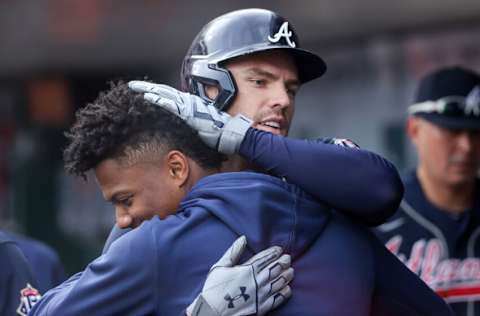 CINCINNATI, OHIO - JUNE 24: Ronald Acuna Jr. #13 and Freddie Freeman #5 of the Atlanta Braves celebrate after Freeman hit a home run in the first inning against the Cincinnati Reds at Great American Ball Park on June 24, 2021 in Cincinnati, Ohio. (Photo by Dylan Buell/Getty Images)