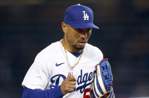 LOS ANGELES, CALIFORNIA - APRIL 14: Mookie Betts #50 of the Los Angeles Dodgers in the seventh inning during the opening series at Dodger Stadium on April 14, 2022 in Los Angeles, California. (Photo by Ronald Martinez/Getty Images)