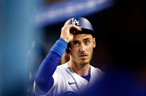 LOS ANGELES, CALIFORNIA - APRIL 14: Cody Bellinger #35 of the Los Angeles Dodgers celebrates a run against the Cincinnati Reds in the eighth inning during the opening series at Dodger Stadium on April 14, 2022 in Los Angeles, California. (Photo by Ronald Martinez/Getty Images)