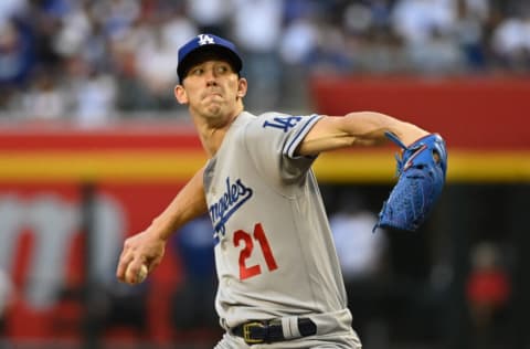 PHOENIX, ARIZONA - APRIL 25: Walker Buehler #21 of the Los Angeles Dodgers delivers a pitch against the Arizona Diamondbacks at Chase Field on April 25, 2022 in Phoenix, Arizona. (Photo by Norm Hall/Getty Images)