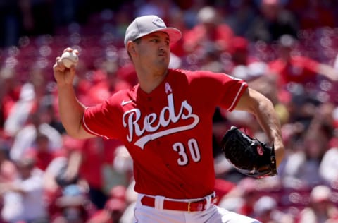 CINCINNATI, OHIO - MAY 08: Tyler Mahle #30 of the Cincinnati Reds pitches in the first inning against the Pittsburgh Pirates at Great American Ball Park on May 08, 2022 in Cincinnati, Ohio. Teams across the league are wearing pink today in honor of Mother's Day. (Photo by Dylan Buell/Getty Images)