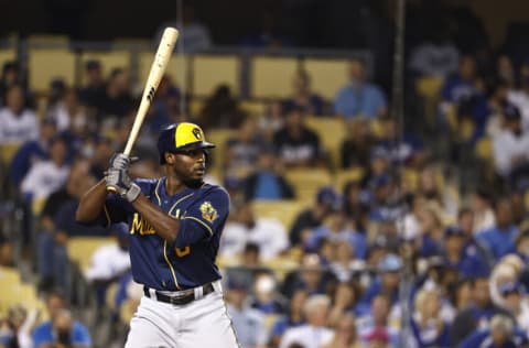 LOS ANGELES, CALIFORNIA - OCTOBER 01: Lorenzo Cain #6 of the Milwaukee Brewers at bat against the Los Angeles Dodgers during the third inning at Dodger Stadium on October 01, 2021 in Los Angeles, California. (Photo by Michael Owens/Getty Images)