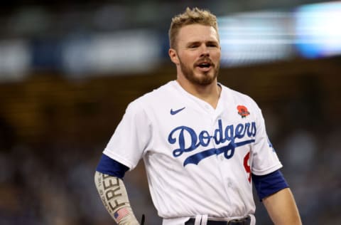 LOS ANGELES, CALIFORNIA - MAY 30: Gavin Lux #9 of the Los Angeles Dodgers react as he returns to the dugout during the game against the Pittsburgh Pirates at Dodger Stadium on May 30, 2022 in Los Angeles, California. (Photo by Harry How/Getty Images)