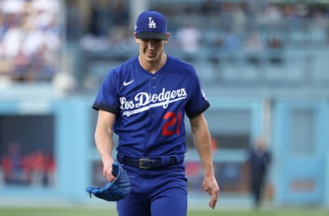 LOS ANGELES, CALIFORNIA - JUNE 04: Walker Buehler #21 of the Los Angeles Dodgers looks on during the first inning against the New York Mets at Dodger Stadium on June 04, 2022 in Los Angeles, California. The New York Mets won 9-4. (Photo by Katelyn Mulcahy/Getty Images)