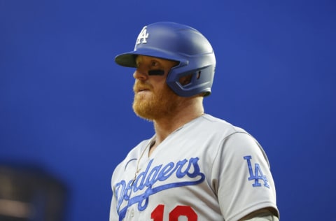 ATLANTA, GA - JUNE 26: Justin Turner #10 of the Los Angeles Dodgers returns to the dugout during the sixth inning against the Atlanta Braves at Truist Park on June 26, 2022 in Atlanta, Georgia. (Photo by Todd Kirkland/Getty Images)