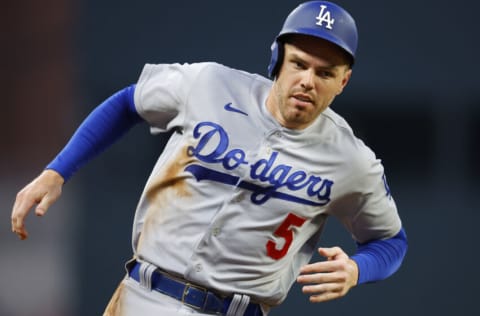 ATLANTA, GA - JUNE 26: Freddie Freeman #5 of the Los Angeles Dodgers races to third during the sixth inning against the Atlanta Braves at Truist Park on June 26, 2022 in Atlanta, Georgia. (Photo by Todd Kirkland/Getty Images)