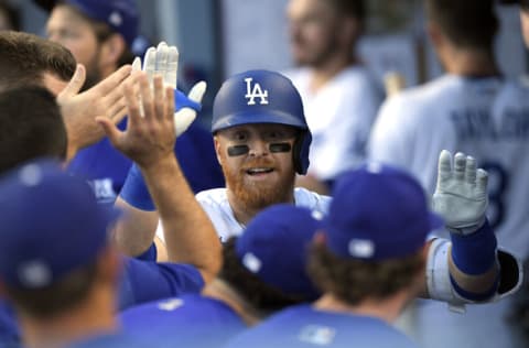 LOS ANGELES, CA - JUNE 30: Justin Turner #10 of the Los Angeles Dodgers celebrates after hitting a solo home run against starting pitcher Joe Musgrove #44 of the San Diego Padres during the second inning at Dodger Stadium on June 30, 2022 in Los Angeles, California. (Photo by Kevork Djansezian/Getty Images)