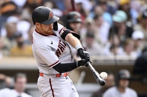 SAN DIEGO, CA - JUNE 16: Jordan Luplow #8 of the Arizona Diamondbacks hits a double during the fourth inning of a baseball game against the San Diego Padres July 16, 2022 at Petco Park in San Diego, California. (Photo by Denis Poroy/Getty Images)