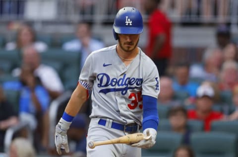 ATLANTA, GA - JUNE 24: Cody Bellinger #35 of the Los Angeles Dodgers flips his bat after striking out during the fourth inning against the Atlanta Braves at Truist Park on June 24, 2022 in Atlanta, Georgia. (Photo by Todd Kirkland/Getty Images)