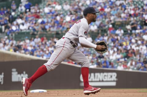 CHICAGO, ILLINOIS - JULY 01: Xander Bogaerts #2 of the Boston Red Sox fields a ball during a game against the Chicago Cubs at Wrigley Field on July 01, 2022 in Chicago, Illinois. (Photo by Nuccio DiNuzzo/Getty Images)