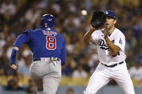 Tyler Anderson #31 of the Los Angeles Dodgers catches Ian Happ #8 of the Chicago Cubs (Photo by Michael Owens/Getty Images)