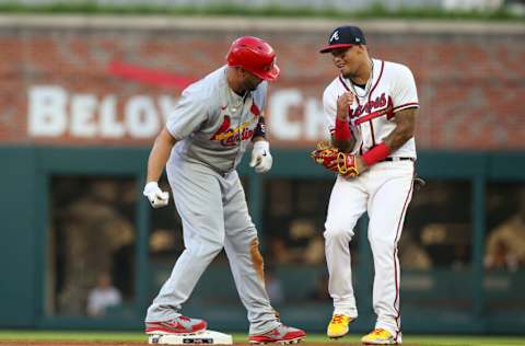 ATLANTA, GA - JULY 06: Albert Pujols #5 of the St. Louis Cardinals jokes with Orlando Arcia #11 of the Atlanta Braves after a double in the fourth inning at Truist Park on July 6, 2022 in Atlanta, Georgia. (Photo by Brett Davis/Getty Images)