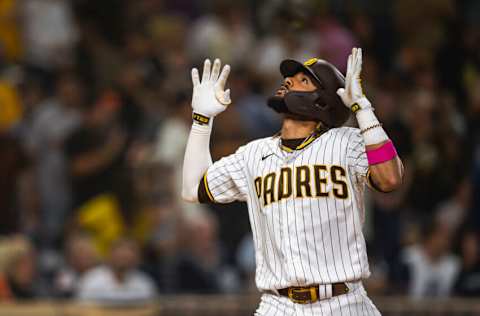 SAN DIEGO, CA - SEPTEMBER 22: Fernando Tatis Jr. #23 of the San Diego Padres celebrates after hitting a home run in the seventh inning against the San Francisco Giants at Petco Park on September 22, 2021 in San Diego, California. (Photo by Matt Thomas/San Diego Padres/Getty Images)