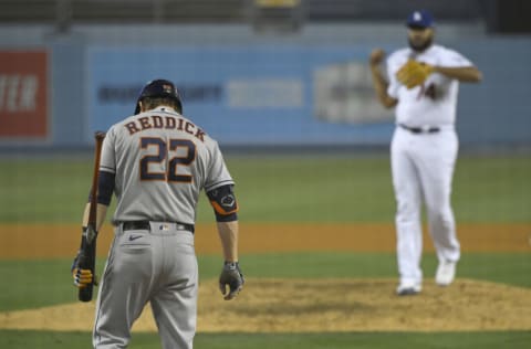 LOS ANGELES, CA - SEPTEMBER 13: Josh Reddick #22 of the Houston Astros faces Kenley Jansen #74 of the Los Angeles Dodgers in the ninth inning at Dodger Stadium on September 13, 2020 in Los Angeles, California. (Photo by John McCoy/Getty Images)