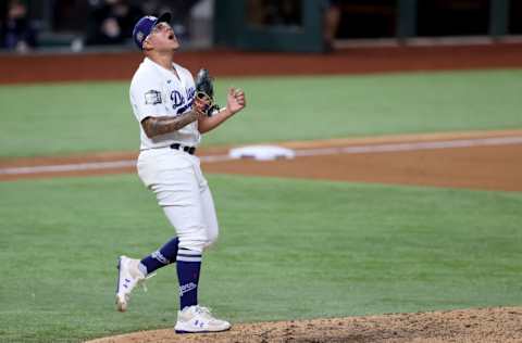 ARLINGTON, TEXAS - OCTOBER 27: Julio Urias #7 of the Los Angeles Dodgers celebrates after defeating the Tampa Bay Rays 3-1 in Game Six to win the 2020 MLB World Series at Globe Life Field on October 27, 2020 in Arlington, Texas. (Photo by Tom Pennington/Getty Images)