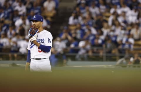 LOS ANGELES, CALIFORNIA - JULY 10: Mookie Betts #50 of the Los Angeles Dodgers defends second base against the Arizona Diamondbacks during the seventh inning at Dodger Stadium on July 10, 2021 in Los Angeles, California. (Photo by Michael Owens/Getty Images)