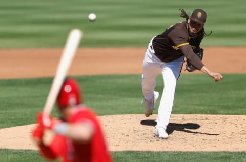 PEORIA, ARIZONA - MARCH 23: Relief pitcher Dinelson Lamet #29 of the San Diego Padres pitches against the Los Angeles Angels during the fourth inning of the MLB spring training game at Peoria Stadium on March 23, 2022 in Peoria, Arizona. (Photo by Christian Petersen/Getty Images)