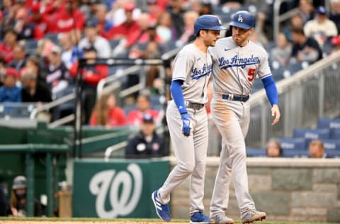 WASHINGTON, DC - MAY 24: Trea Turner #6 of the Los Angeles Dodgers celebrates with Freddie Freeman #5 after hitting a home run against the Washington Nationals at Nationals Park on May 24, 2022 in Washington, DC. (Photo by G Fiume/Getty Images)