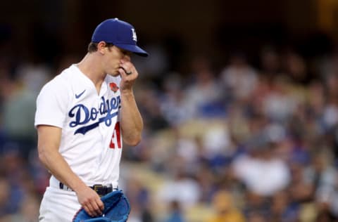 LOS ANGELES, CALIFORNIA - MAY 30: Walker Buehler #21 of the Los Angeles Dodgers reacts as he leaves the mound during the second inning against the Pittsburgh Pirates at Dodger Stadium on May 30, 2022 in Los Angeles, California. (Photo by Harry How/Getty Images)