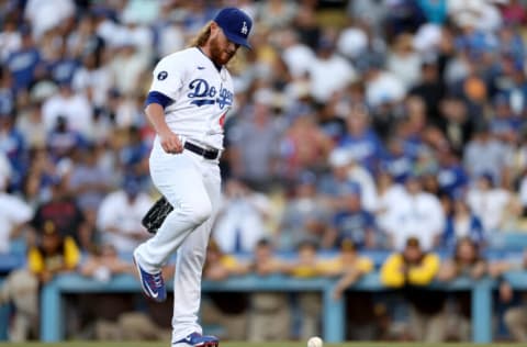 LOS ANGELES, CALIFORNIA - AUGUST 07: Craig Kimbrel #46 of the Los Angeles Dodgers goes to kick a foul ball off the filed during the ninth inning in a 4-0 win over the San Diego Padres at Dodger Stadium on August 07, 2022 in Los Angeles, California. (Photo by Harry How/Getty Images)