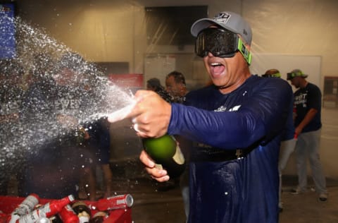 PHOENIX, ARIZONA - SEPTEMBER 13: Manager Dave Roberts #30 of the Los Angeles Dodgers celebrates with teammates in the locker room after defeating the Arizona Diamondbacks at Chase Field on September 13, 2022 in Phoenix, Arizona. The Dodgers defeated the Diamondbacks 4-0 to clinch the National League West division. ˆ (Photo by Christian Petersen/Getty Images)