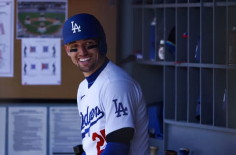 LOS ANGELES, CALIFORNIA - SEPTEMBER 20: Trayce Thompson #25 of the Los Angeles Dodgers looks on from the dugout during the third inning against the Arizona Diamondbacks in game one of a doubleheader at Dodger Stadium on September 20, 2022 in Los Angeles, California. (Photo by Katelyn Mulcahy/Getty Images)