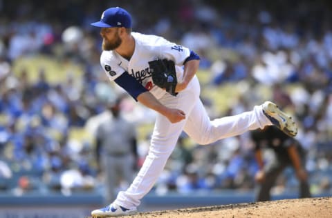 LOS ANGELES, CA - JULY 25: Jimmy Nelson #41 of the Los Angeles Dodgers pitches against the Colorado Rockies at Dodger Stadium on July 25, 2021 in Los Angeles, California. (Photo by John McCoy/Getty Images)