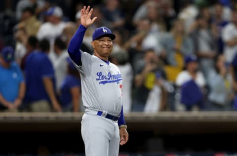 SAN DIEGO, CALIFORNIA - SEPTEMBER 29: Manager Dave Roberts of the Los Angeles Dodgers looks on during a game against the San Diego Padres at PETCO Park on September 29, 2022 in San Diego, California. (Photo by Sean M. Haffey/Getty Images)