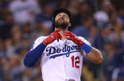 LOS ANGELES, CALIFORNIA - OCTOBER 04: Joey Gallo #12 of the Los Angeles Dodgers celebrates his solo homerun to tie the game 2-2 with the Colorado Rockies, during the fifth inning at Dodger Stadium on October 04, 2022 in Los Angeles, California. (Photo by Harry How/Getty Images)