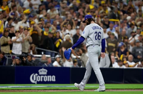 SAN DIEGO, CALIFORNIA - OCTOBER 14: Tony Gonsolin #26 of the Los Angeles Dodgers walks off the field after being pulled from the game against the San Diego Padres during the second inning in game three of the National League Division Series at PETCO Park on October 14, 2022 in San Diego, California. (Photo by Harry How/Getty Images)