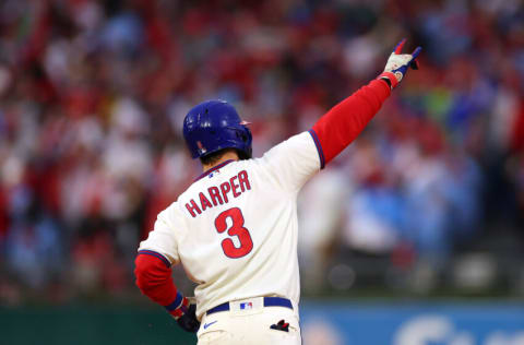 PHILADELPHIA, PENNSYLVANIA - OCTOBER 23: Bryce Harper #3 of the Philadelphia Phillies reacts after hitting a two run home run during the eighth inning against the San Diego Padres in game five of the National League Championship Series at Citizens Bank Park on October 23, 2022 in Philadelphia, Pennsylvania. (Photo by Mike Ehrmann/Getty Images)