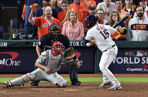 HOUSTON, TEXAS - OCTOBER 28: Aledmys Diaz #16 of the Houston Astros is hit by a pitch during the tenth inning in Game One of the 2022 World Series at Minute Maid Park on October 28, 2022 in Houston, Texas. Home plate umpire James Hoye ruled that Diaz deliberately leaned into the pitch. (Photo by Bob Levey/Getty Images)