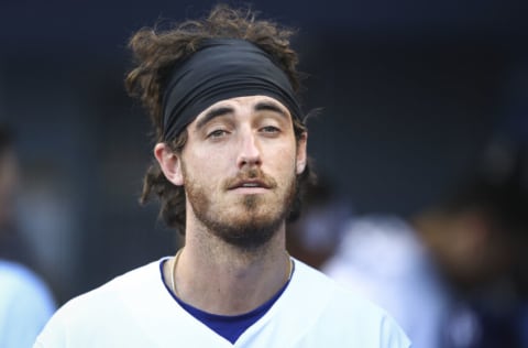 LOS ANGELES, CALIFORNIA - JUNE 27: Cody Bellinger #35 of the Los Angeles Dodgers looks on from the dugout between innings against the Chicago Cubs at Dodger Stadium on June 27, 2021 in Los Angeles, California. (Photo by Meg Oliphant/Getty Images)