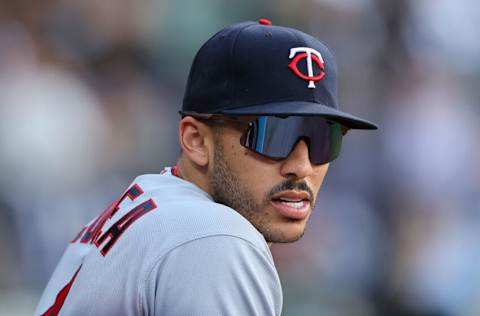 CHICAGO, ILLINOIS - OCTOBER 05: Carlos Correa #4 of the Minnesota Twins looks on against the Chicago White Sox at Guaranteed Rate Field on October 05, 2022 in Chicago, Illinois. (Photo by Michael Reaves/Getty Images)