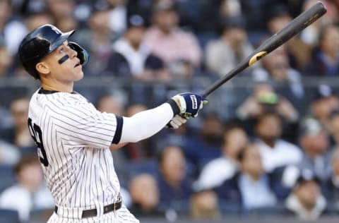 NEW YORK, NEW YORK - OCTOBER 18: Aaron Judge #99 of the New York Yankees hits a home run against the Cleveland Guardians during the second inning in game five of the American League Division Series at Yankee Stadium on October 18, 2022 in New York, New York. (Photo by Sarah Stier/Getty Images)