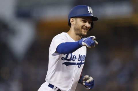 LOS ANGELES, CALIFORNIA - JUNE 15: Trea Turner #6 of the Los Angeles Dodgers celebrates as he rounds the bases after hitting a solo home run against the Los Angeles Angels during the third inning at Dodger Stadium on June 15, 2022 in Los Angeles, California. (Photo by Michael Owens/Getty Images)