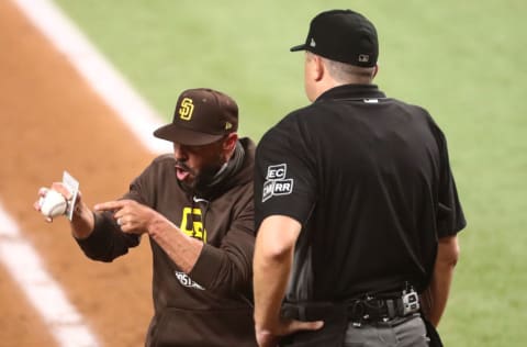 Oct 6, 2020; Arlington, Texas, USA; San Diego Padres manager Jayce Tingler (32) argues with umpire Lance Barrett after he was ejected during the sixth inning in game one of the 2020 NLDS against the Los Angeles Dodgers at Globe Life Field. Mandatory Credit: Kevin Jairaj-USA TODAY Sports